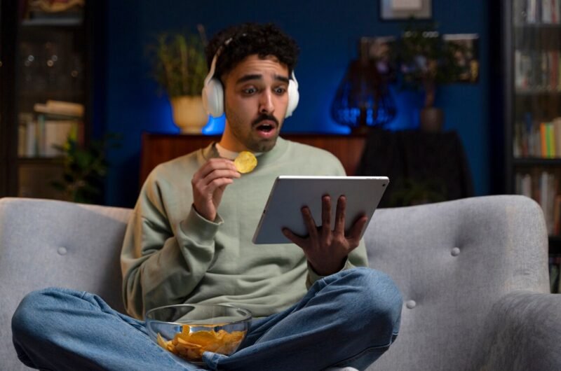 young-man-enjoying-movie-night_23-2149307345 young-man-enjoying-movie-night_23-2149307345
